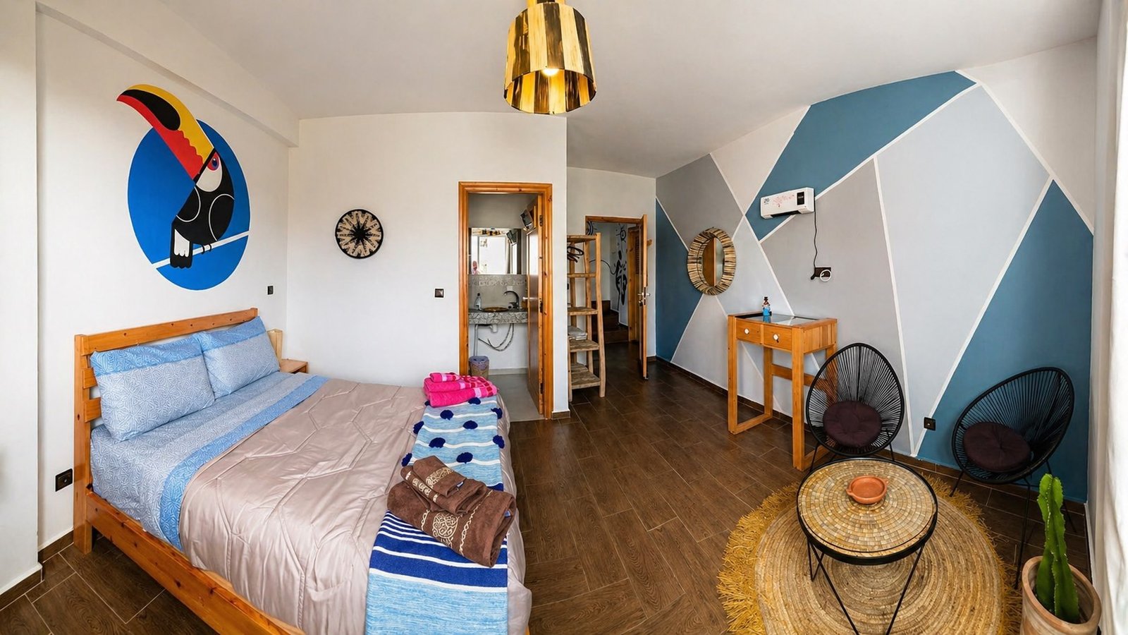 Blue Room at Dar Mouja with double bed, handmade decor, and seating area